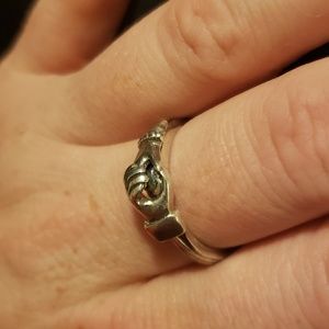 Claddagh Ring with interlocking puzzle heart hands